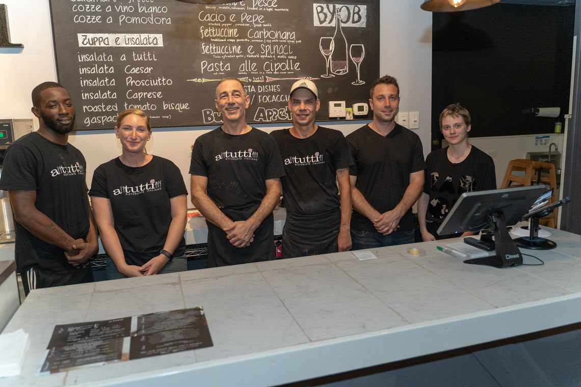 Photo: Paul Marrone (pictured third from left) owner and operator of A Tutti Restaurant joined by his staff