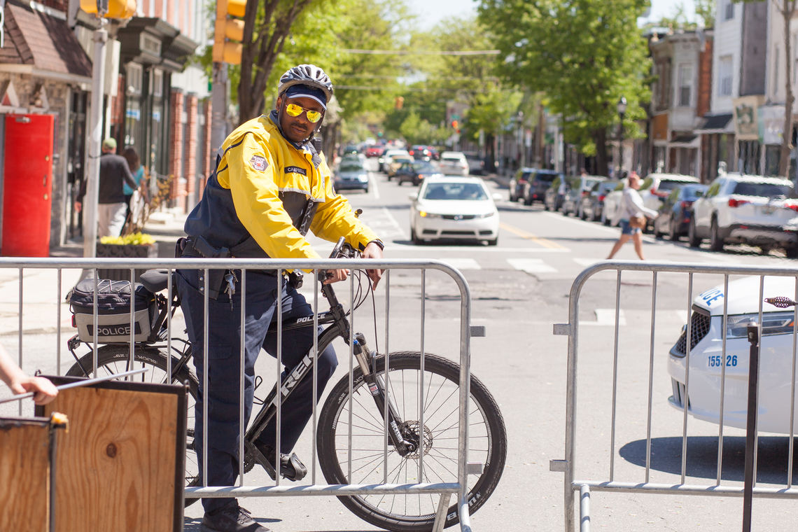 Photo: 5th District Officer Leon Campbell watches over the annual Art Is Life street festival